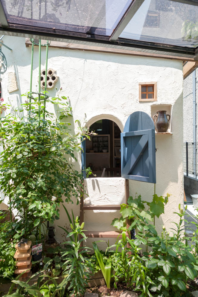 フィトライフのアリスをモチーフにした庭小屋（隠しドア）